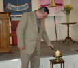 Danny lights the Chalice